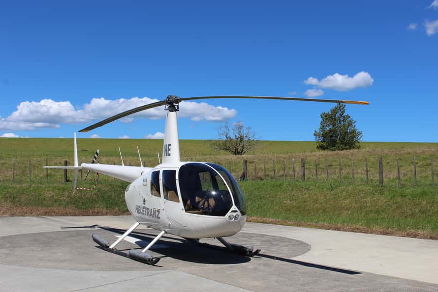 Auckland: 36 min scenic helicopter flight - Coast to Coast - Back toward downtown: Sky Tower, Viaduct Harbour, and the harbour bridge moment