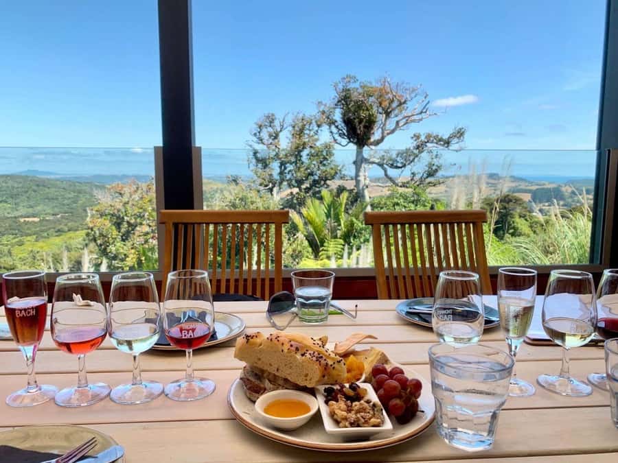 Auckland: Waiheke Island Wine and Food Tasting with Flights - The Best Parts of the Waiheke Time: Photo Stops and Island Driving