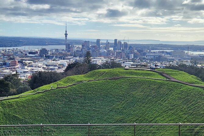 Private Auckland best Spots + Piha beach and rainforest day Tour - Mission Bay lunch by the water, plus a thoughtful memorial stop