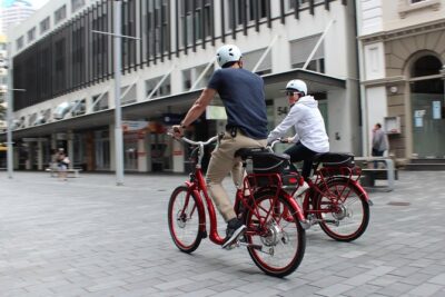 The Classic: our most popular electric bike tour of Auckland's Highlights - Starting at Quay Street with a headset guide and a tight group