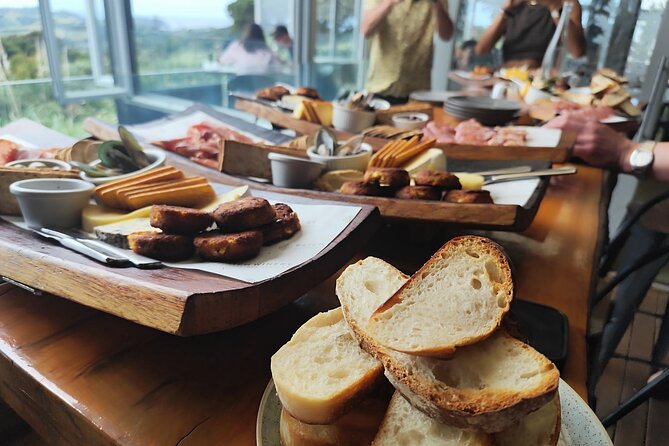 Waiheke Island: Scenic Wine Tour on a Double Decker Bus - Stop 1 at Batch Winery: Chardonnay and charcuterie with sea-air views