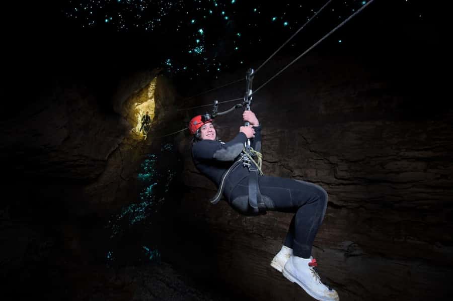 Waitomo Caves Black Abyss Ultimate Caving Experience - Climbing underground waterfalls: the workout you didn’t notice until it starts