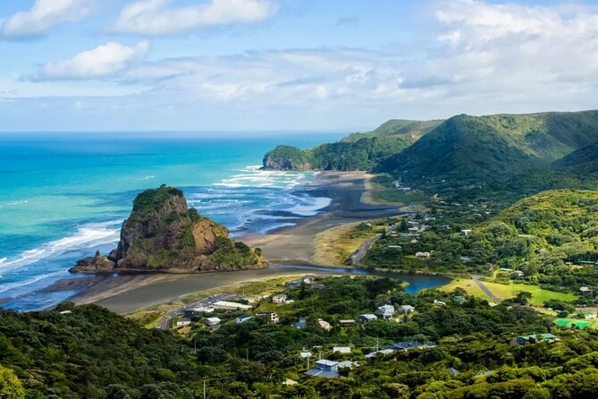 West Coast Discovery Tour - Piha Surf Beach: black sand, big waves, and Lion Rock photo time